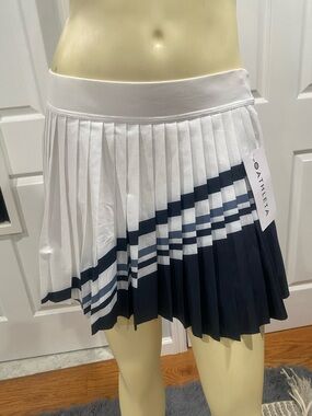 Athleta White and Navy Pleated Athletic Skirt/ Size Medium/ shorts underneath.